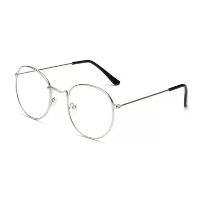 Retro oval anti-blue light glasses with a dark metal frame and clear lenses on a white background. - Image 6