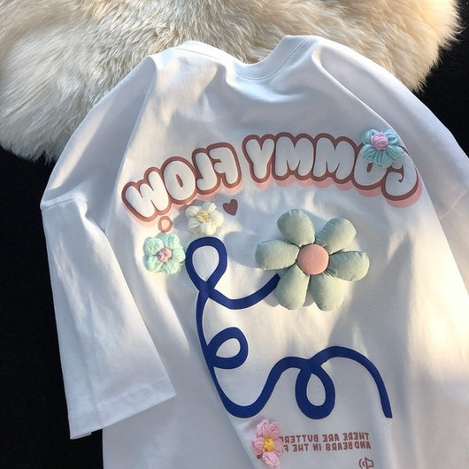 Playera Estampada con Letras Florales y Espuma - Image 12