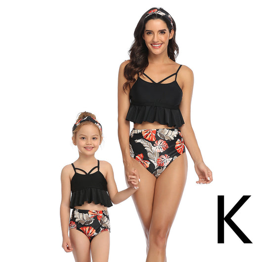 Mother and child in matching peach and green tropical print split bikinis with ruffled tops and high-waisted bottoms. - Image 18