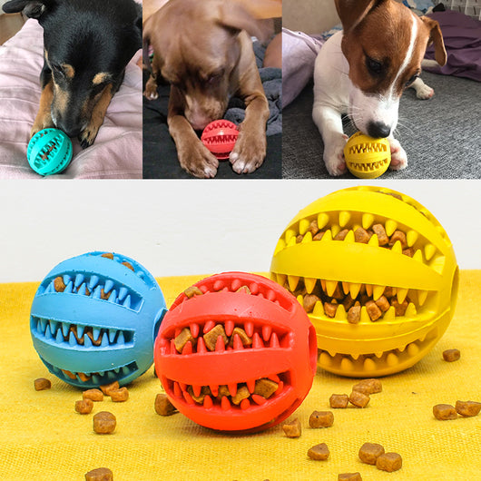 Teal rubber slow feeder dog toy ball with internal spikes for teeth cleaning and treat dispensing, 7cm size. - Image 25