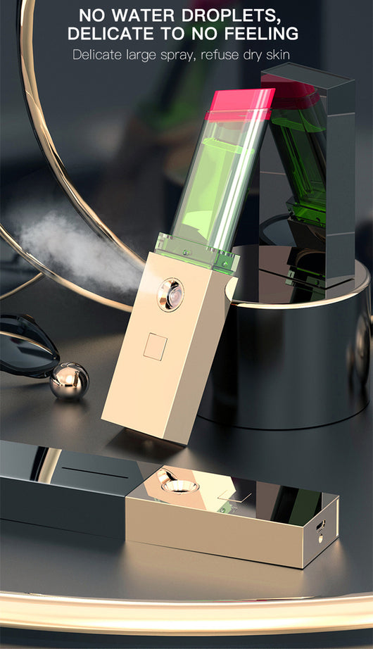 Two sleek black and gold nano spray water replenishing instruments on a dark, reflective surface. - Image 12