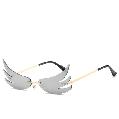 Rimless flame-shaped sunglasses with silver reflective lenses, gold metal temples, and black temple tips. - Image 6