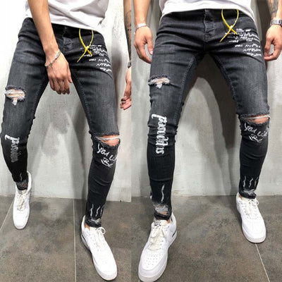 Pantalones con Roturas Estampado Letras Inglesas