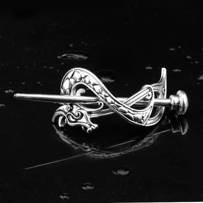 Silver metal hair clip with a retro dragon head and infinity knot design, secured by a plug-in hairpin. - Image 20