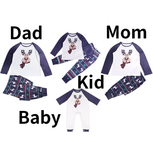 White and navy blue baby romper with a reindeer graphic wearing a red plaid scarf, featuring long raglan sleeves and snap closures.