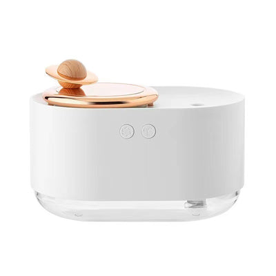 Dark green and rose gold rotating planet humidifier with a clear water tank and a wooden planet-like top. - Image 2