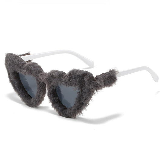Pink plush heart-shaped sunglasses with light pink tinted lenses and matching pink plastic temples. - Image 3