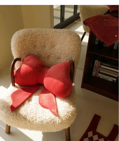 Almohada Decorativa con Lazo Rojo - Image 6
