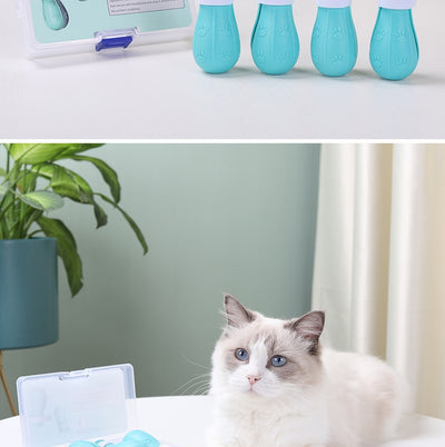 Four teal rubber cat paw covers with white hook-and-loop straps and paw print details, designed for anti-scratch protection. - Image 16