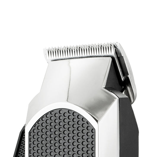 VGR V-130 professional hair clipper set with silver and black clipper, four guide combs, scissors, comb, and oil. - Image 6