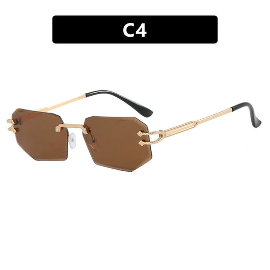 Rimless octagonal clear lens glasses with silver-toned metal temples and black ear tips, featuring decorative accents. - Image 8