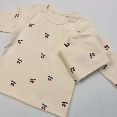 Light yellow infant long-sleeved pajama set with milk bottle and cookie print, suitable for homewear. - Image 10