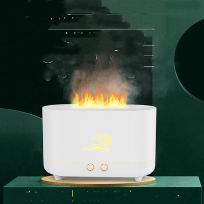 White simulated flame humidifier with a golden wave logo, emitting orange light and mist, on a dark green background. - Image 6