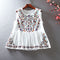 Blusa Retro Holgada con Bordado Floral