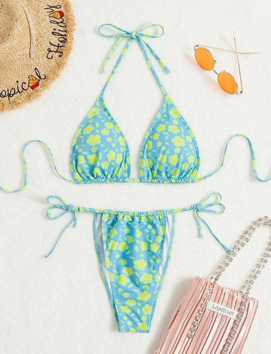 Lace-up sexy bikini with light blue and yellow floral print, featuring a triangle top and string tie bottoms. - Image 9