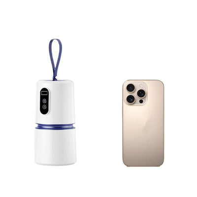 White and blue mini household air dryer with a digital display and hanging loop, shown next to a gold smartphone. - Image 4