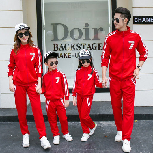 Red polyester sports suit with a full-zip jacket featuring white stripes and a '7' graphic, paired with matching pants. - Image 9