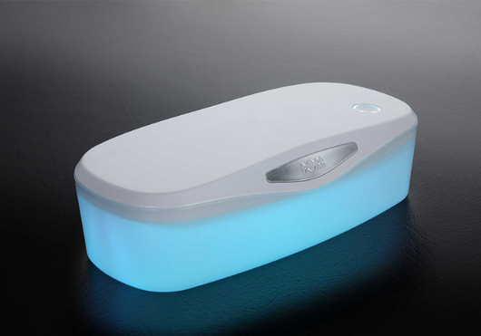 White and grey ultraviolet sterilization box with a glowing blue interior, ideal for sanitizing small items. - Image 3