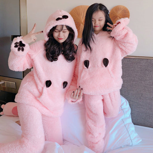 Mother and child wearing matching brown plush bear pajamas with hoods, ears, and embroidered paw gloves. - Image 3