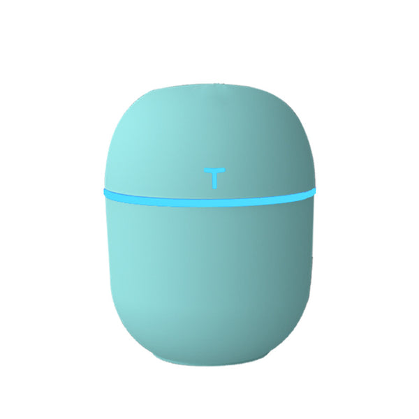 Teal egg-shaped USB humidifier with a glowing blue light band and a 'T' shaped indicator on top. - Image 10