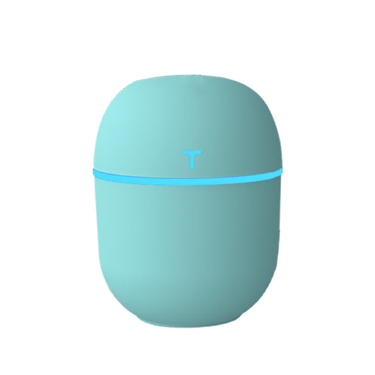Teal egg-shaped USB humidifier with a glowing blue light band and a 'T' shaped indicator on top. - Image 10