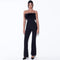 Jumpsuit Elegante con Detalle de Plumas y Diseño Ceñido