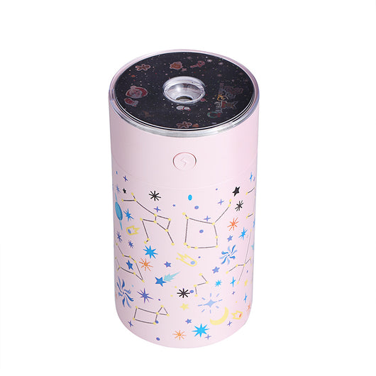 Dark green cylindrical humidifier with a clear top, featuring a colorful celestial pattern of stars, planets, and constellations. - Image 14
