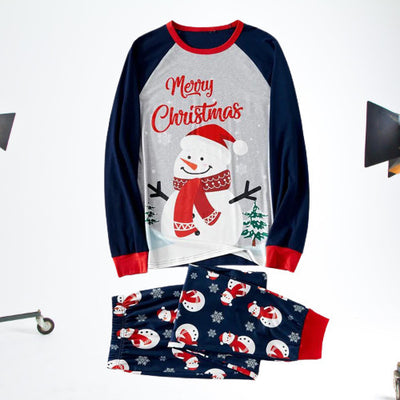 Matching family Christmas pajamas with dark blue long-sleeve tops, light gray fronts, and a snowman graphic. - Image 4
