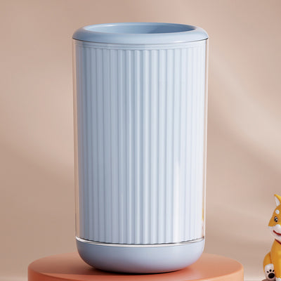 Light blue pet foot washing cup with a white paw print design, ribbed texture, and smooth base. - Image 12