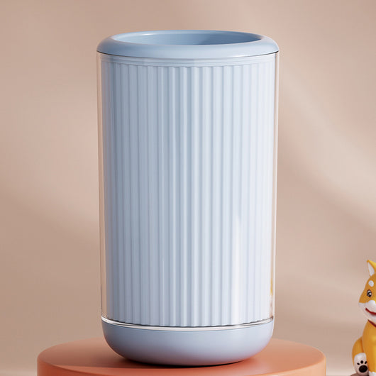 Light blue pet foot washing cup with a white paw print design, ribbed texture, and smooth base. - Image 12
