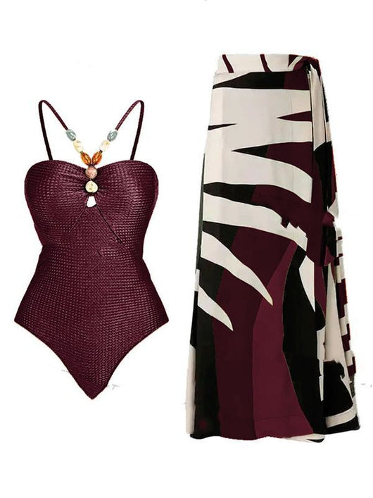 Women's olive green ribbed one-piece swimsuit with colorful beaded straps and matching abstract print sarong skirt. - Image 10