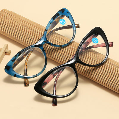 Black cat-eye anti-blue light reading glasses with green patterned temples on a white background.