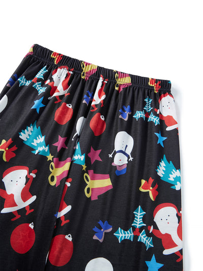 Man wearing a black and red long-sleeve Christmas pajama set with "Merry Christmas" graphic and Santa print pants. - Image 21
