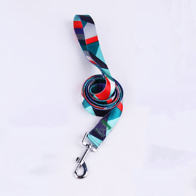 Pink, black, and white patterned polyester dog leash with a silver metal swivel snap hook, coiled on a white background. - Image 11