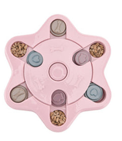 Paw-shaped dog puzzle feeder toy in light yellow with colorful sliding covers, filled with kibble. - Image 21