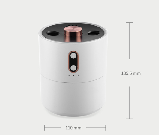 White volcanic flame aroma essential oil diffuser emitting orange light and mist on a wooden desk next to a laptop. - Image 8