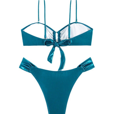 Solid black glossy two-piece bikini with a bandeau top featuring a ruched front and U-shaped detail, and high-cut ruched bottoms. - Image 5