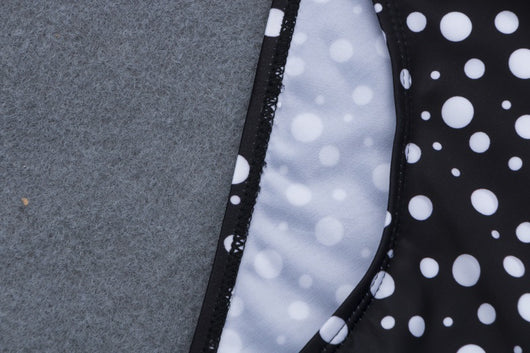 Retro black and white polka dot bikini with a tie-front top and high-waisted bottom. - Image 10