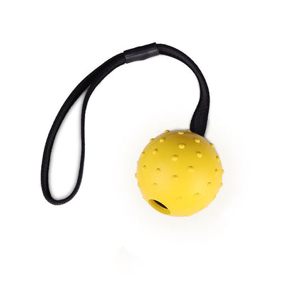 Red rubber dog training ball with nubs and a black rope handle, designed for bite resistance and molar cleaning. - Image 4