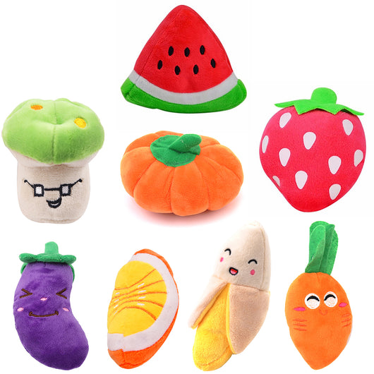 Purple plush eggplant pet toy with a green stem and an embroidered happy face, designed for dogs and cats. - Image 3