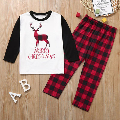 Family matching Christmas pajamas with red and black buffalo plaid pants and white long-sleeve tops featuring a deer graphic and "MERRY CHRISTMAS" text. Include - Image 11
