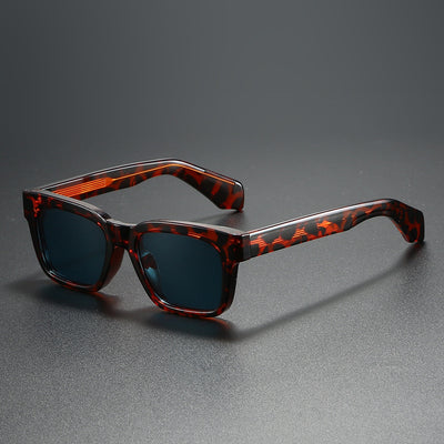 Black square-frame sunglasses with bright orange polarized lenses, designed for outdoor driving and anti-glare. - Image 26