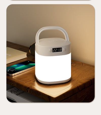 White rechargeable LED table lamp with a digital clock display and a light gray carrying handle. - Image 14