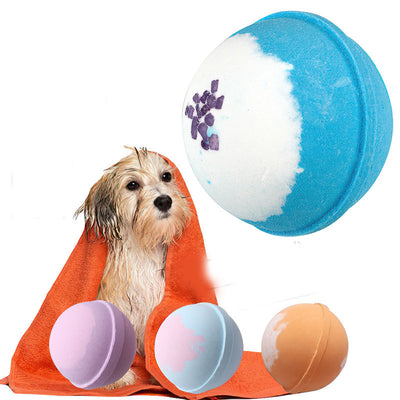 Orange pet bath bomb with white speckles, designed for cat and dog bathing and grooming.