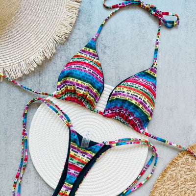 Women's multicolor letter printed lace-up bikini suit with triangle top and thong bottom, displayed on a white mat. - Image 13