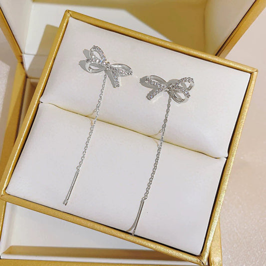 Aretes de Moño Elegante con Borla Larga - Image 2