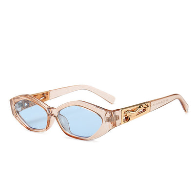 Angular cat-eye sunglasses with a tortoiseshell frame, brown gradient lenses, and gold jumping cheetah temple details. - Image 24