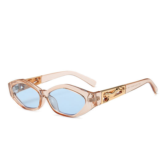 Angular cat-eye sunglasses with a tortoiseshell frame, brown gradient lenses, and gold jumping cheetah temple details. - Image 24