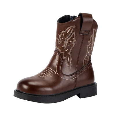 Girls' brown Martin boots with white ethnic embroidery, side zippers, and black soles, displayed on a light carpet. - Image 5