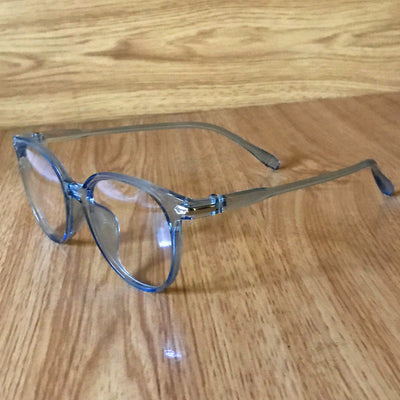 Pink round-frame anti-blue light glasses with clear lenses and small silver accents on the temples. - Image 12